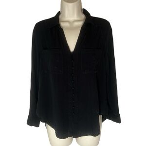Women’s black top. Front buttons and long sleeve size M